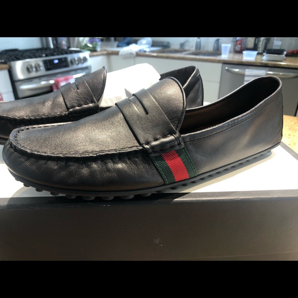 Men’s Gucci Loafers... brand new in box. Size 9.